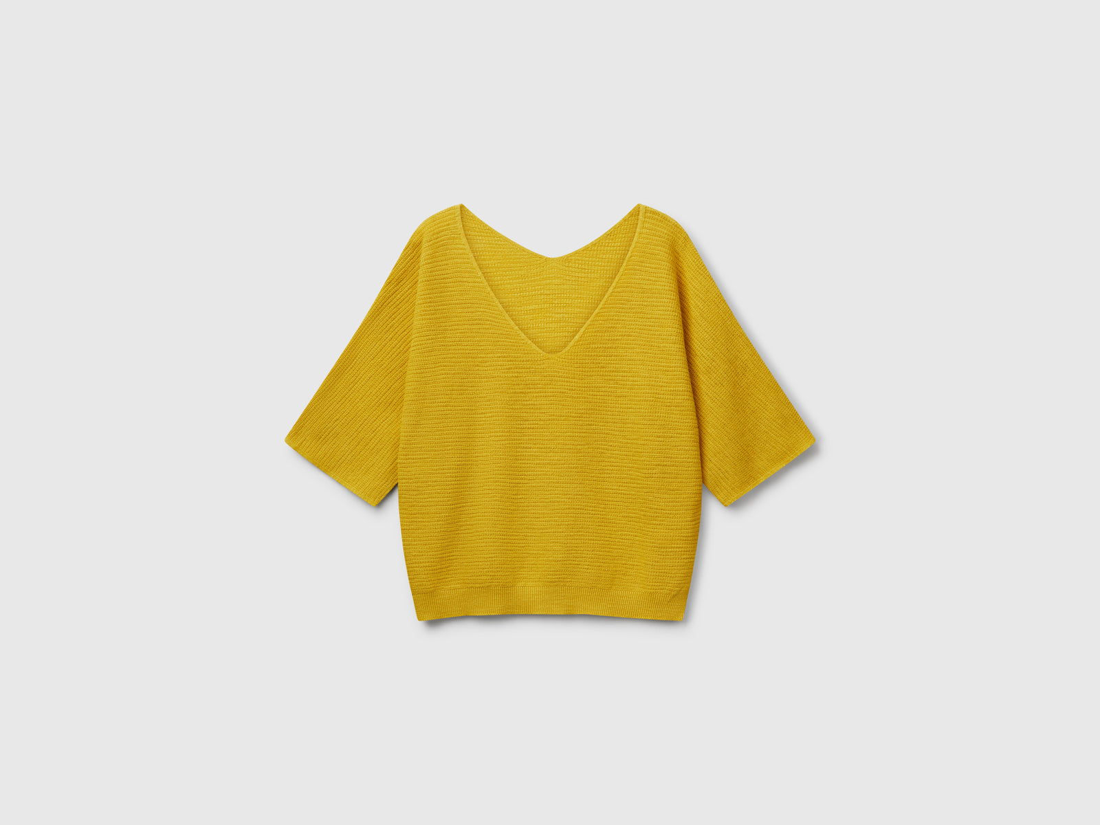 Maglia reversibile cropped da donna senape | Benetton Outlet