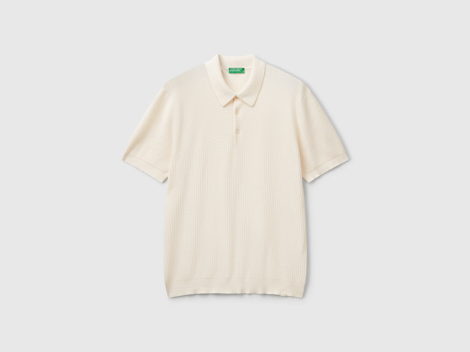Polo in maglia a manica corta da uomo bianco panna | Benetton Outlet