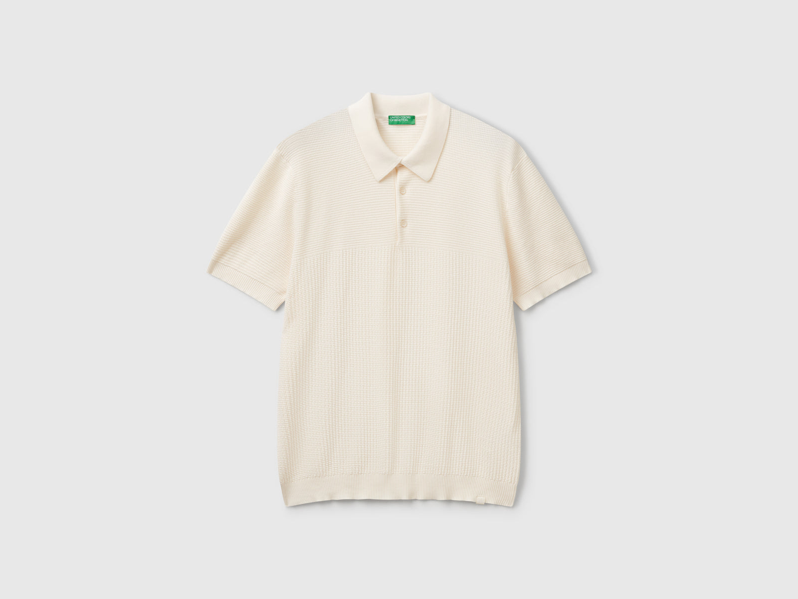 Polo in maglia a manica corta da uomo bianco panna | Benetton Outlet