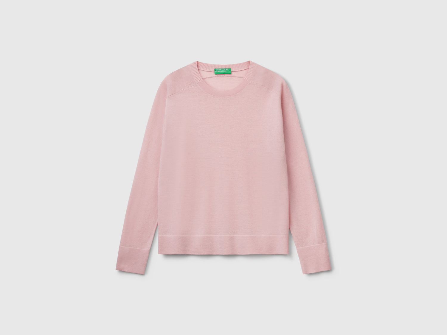 Maglia in pura lana Merino da donna rosa tenue | Benetton Outlet