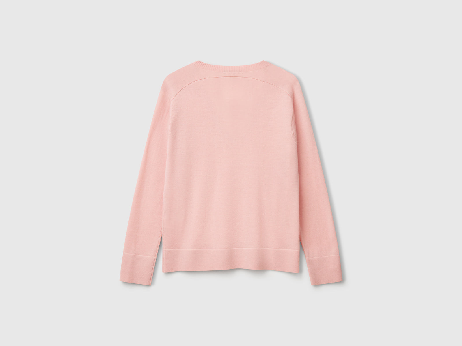 Maglia con scollo a V in pura lana Merino da donna rosa tenue 2 | Benetton Outlet