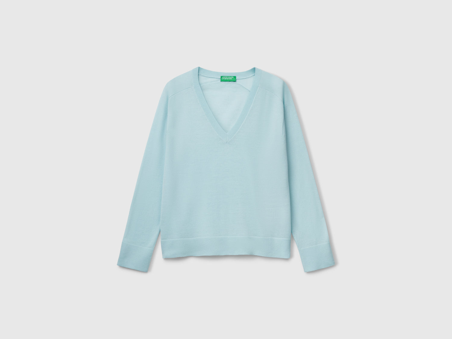 Maglia con scollo a V in pura lana Merino da donna verde acqua | Benetton Outlet