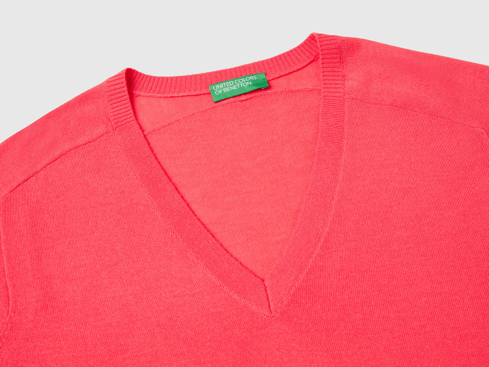 Maglia con scollo a V in pura lana Merino da donna fucsia 3 | Benetton Outlet
