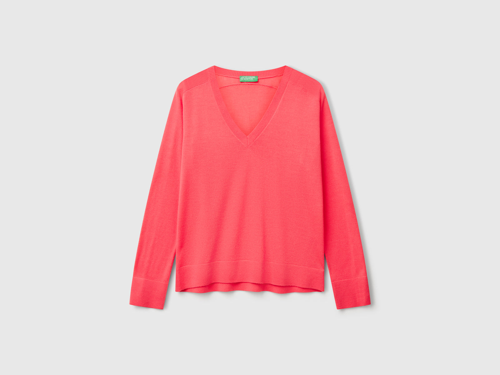 Maglia con scollo a V in pura lana Merino da donna fucsia | Benetton Outlet
