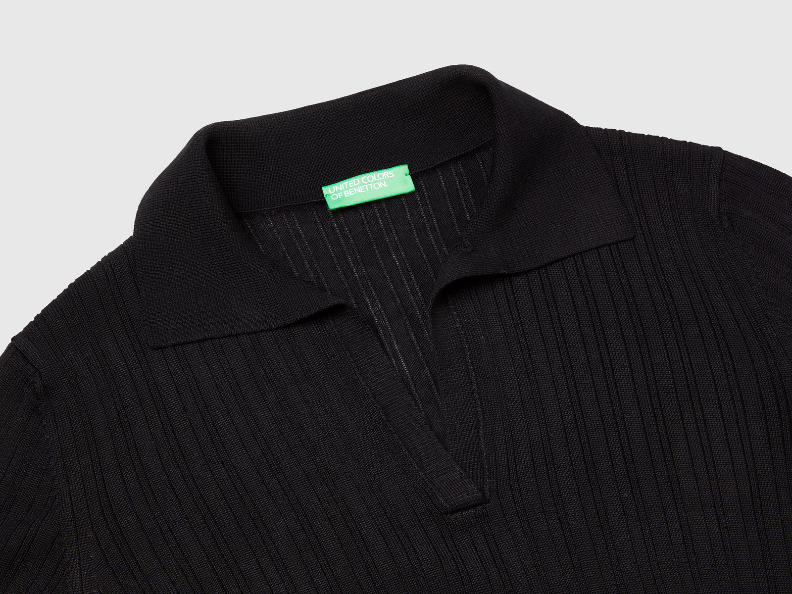 Polo in maglia a manica corta da donna nero 3 | Benetton Outlet