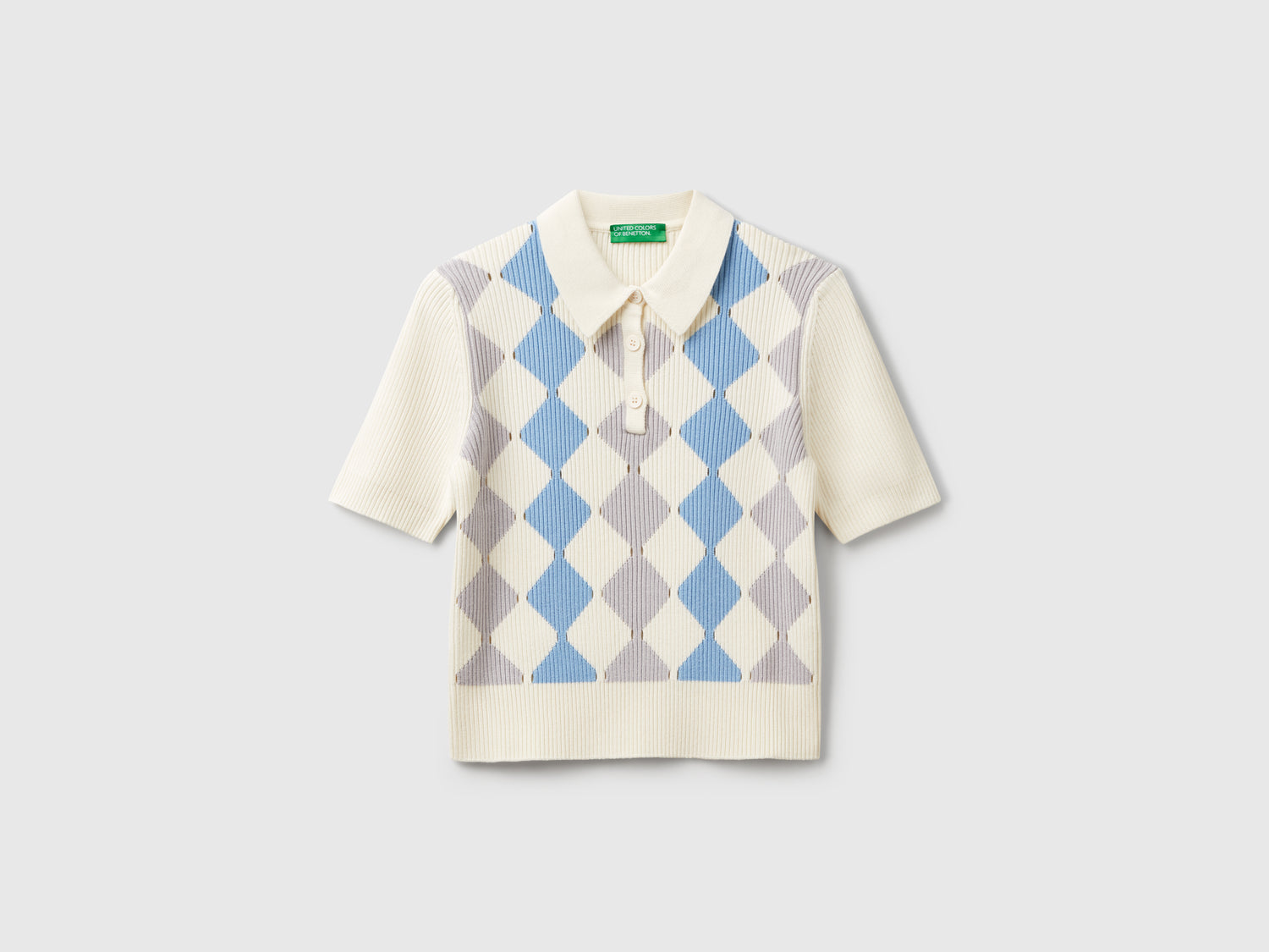 Polo in maglia con intarsio rombi da donna bianco | Benetton Outlet
