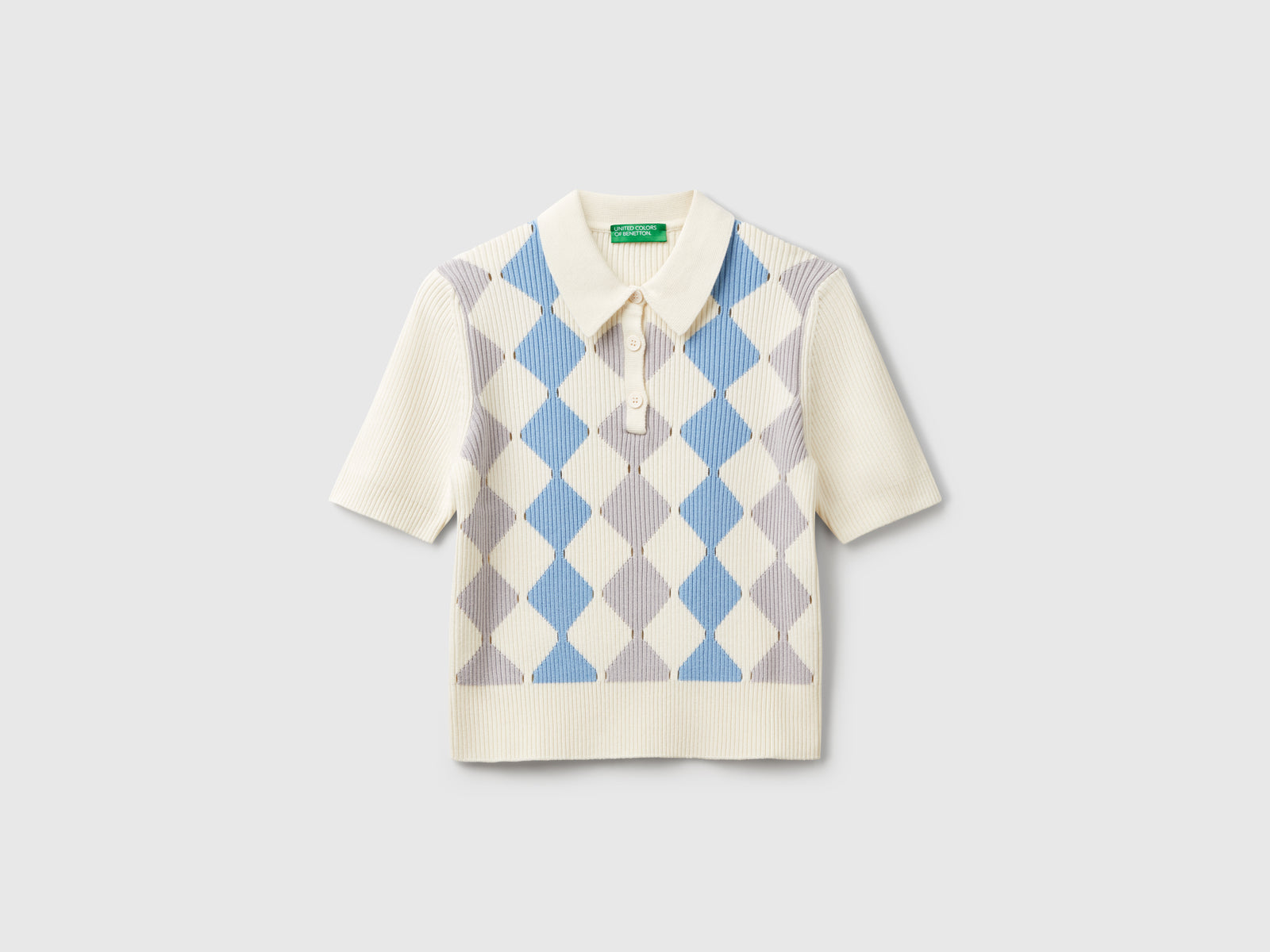 Polo in maglia con intarsio rombi da donna bianco | Benetton Outlet