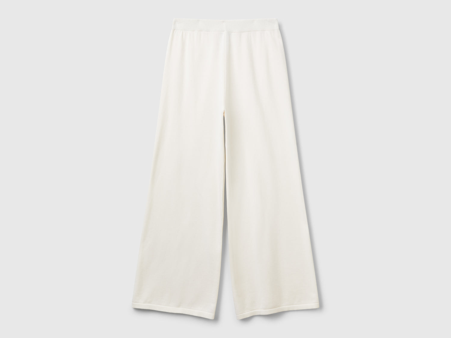 Pantaloni ampi in maglia da donna bianco panna | Benetton Outlet