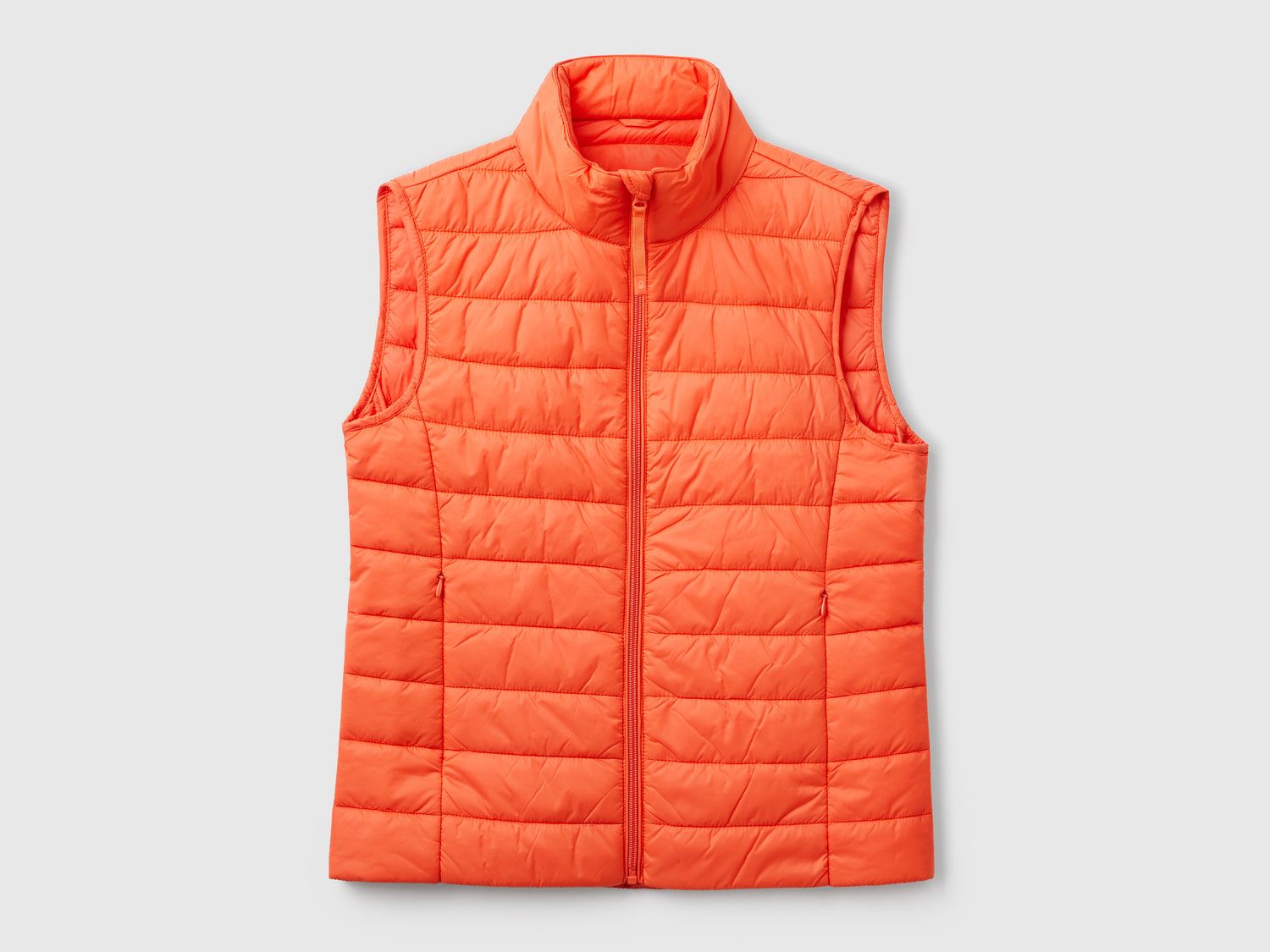 Smanicato slim fit imbottito da donna arancione | Benetton Outlet