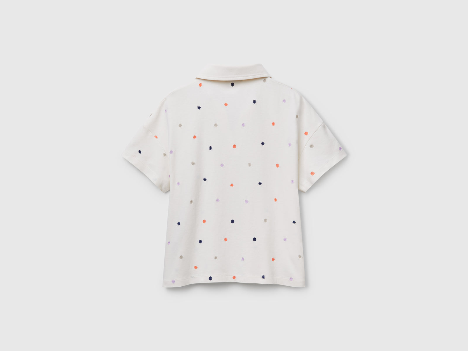 Polo con ricamo fiori da donna bianco panna 2 | Benetton Outlet