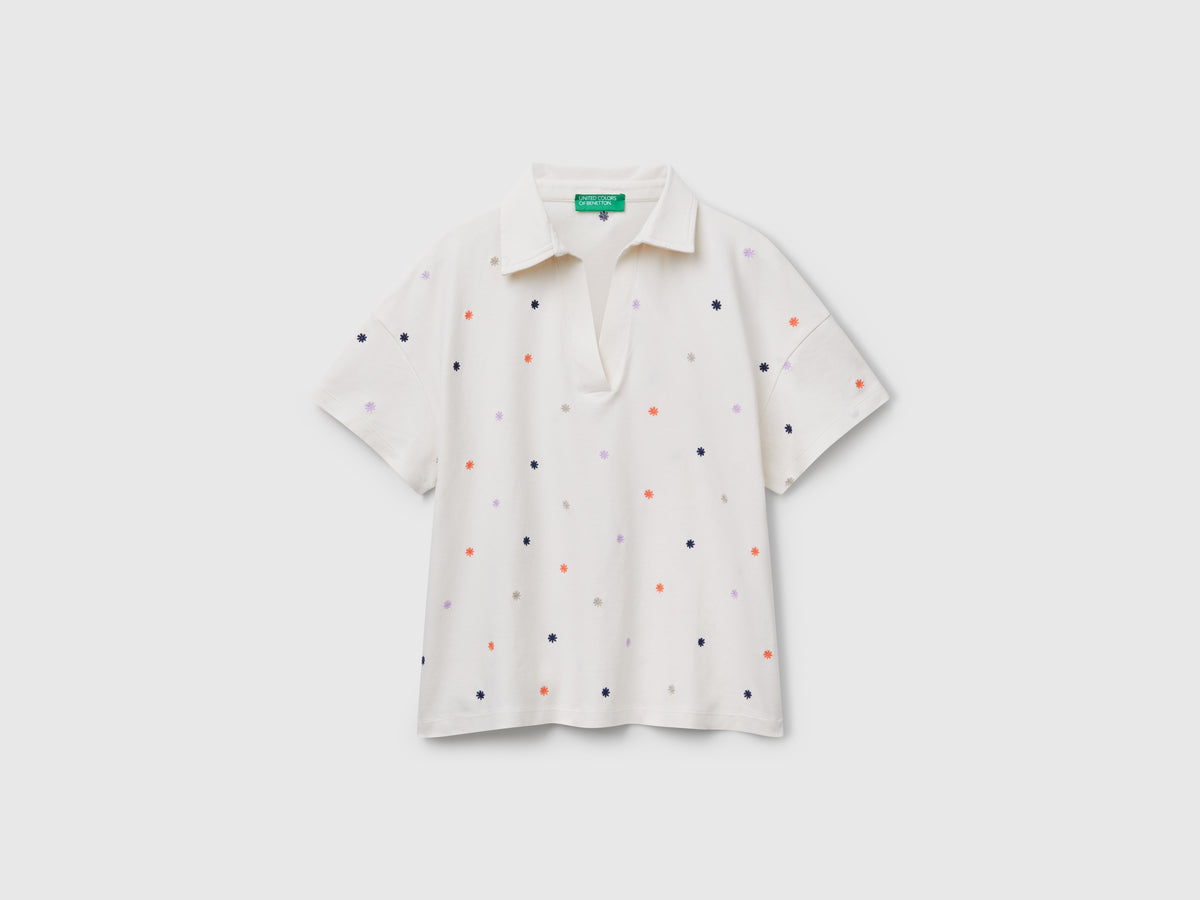 Polo con ricamo fiori