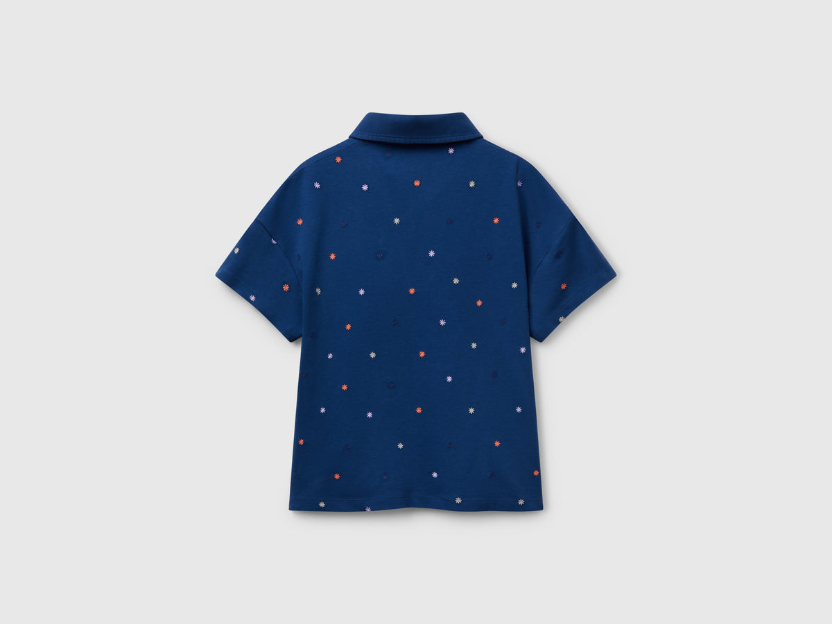 Polo con ricamo fiori