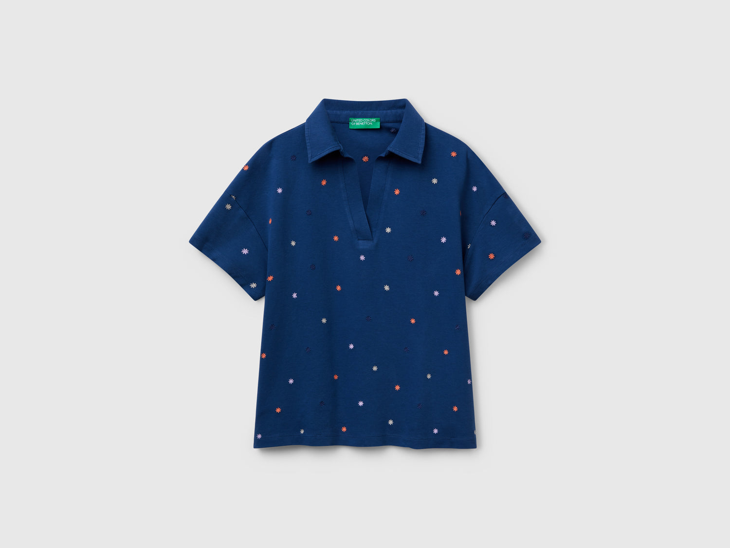 Polo con ricamo fiori da donna blu scuro | Benetton Outlet