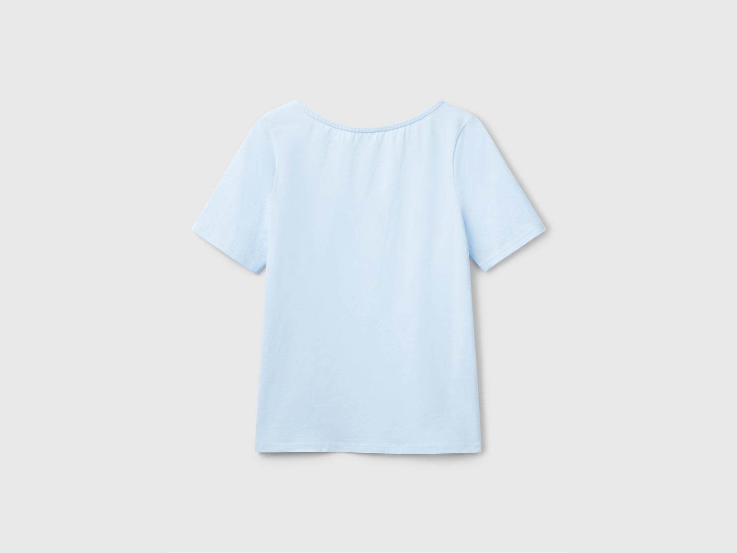 T-shirt slim fit reversibile da donna celeste | Benetton Outlet