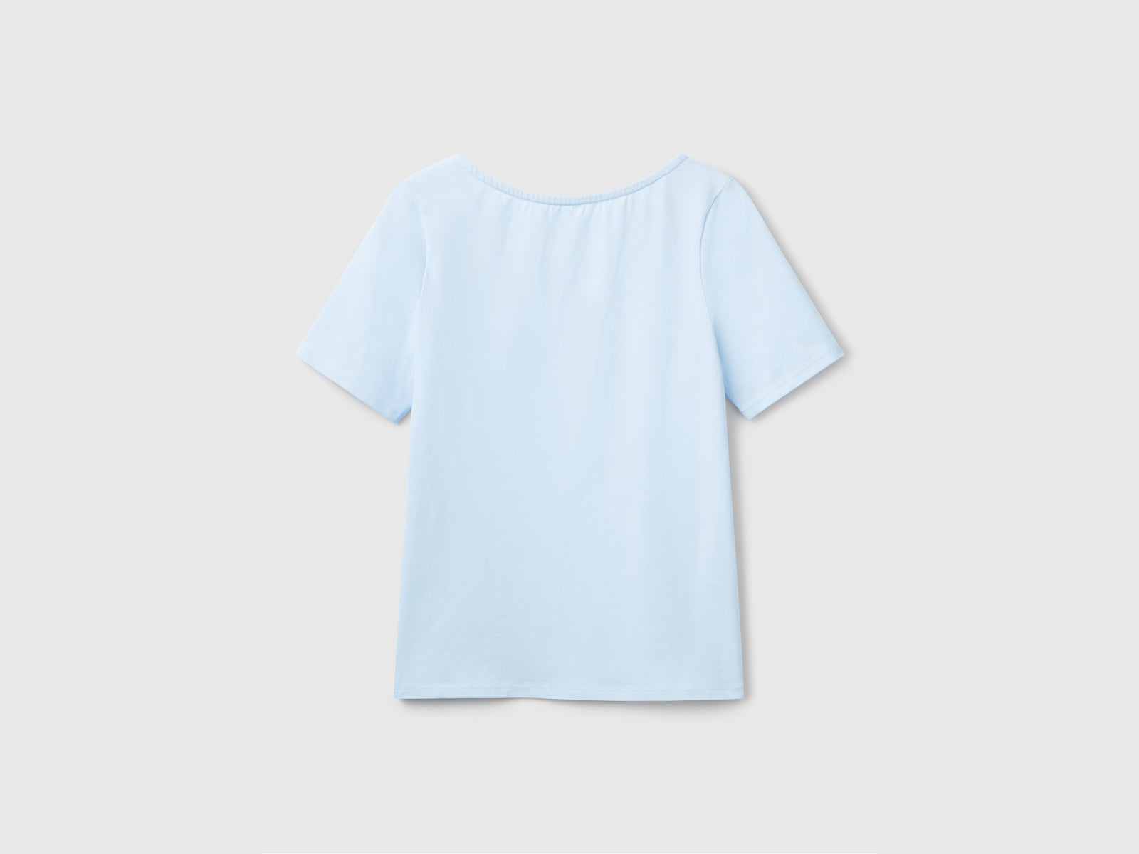 T-shirt slim fit reversibile da donna celeste | Benetton Outlet