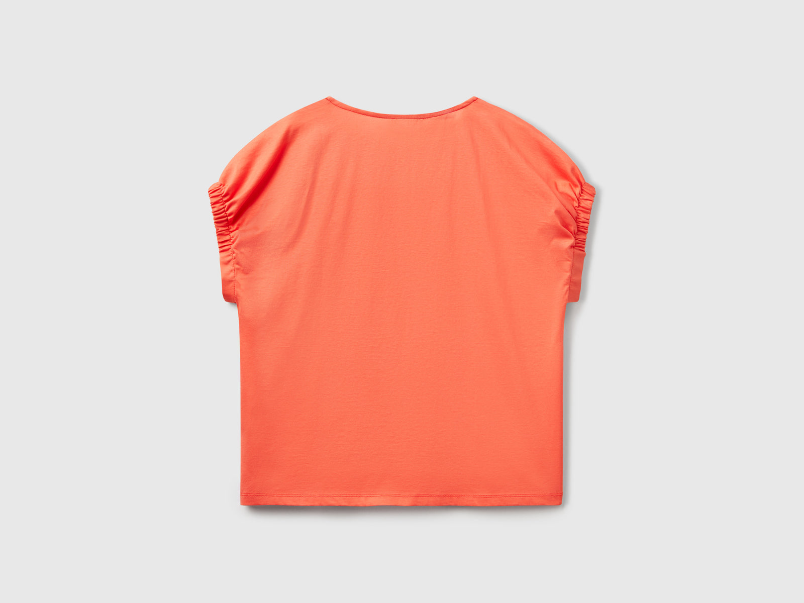 Maglietta con nodo e cut out da donna arancione 2 | Benetton Outlet