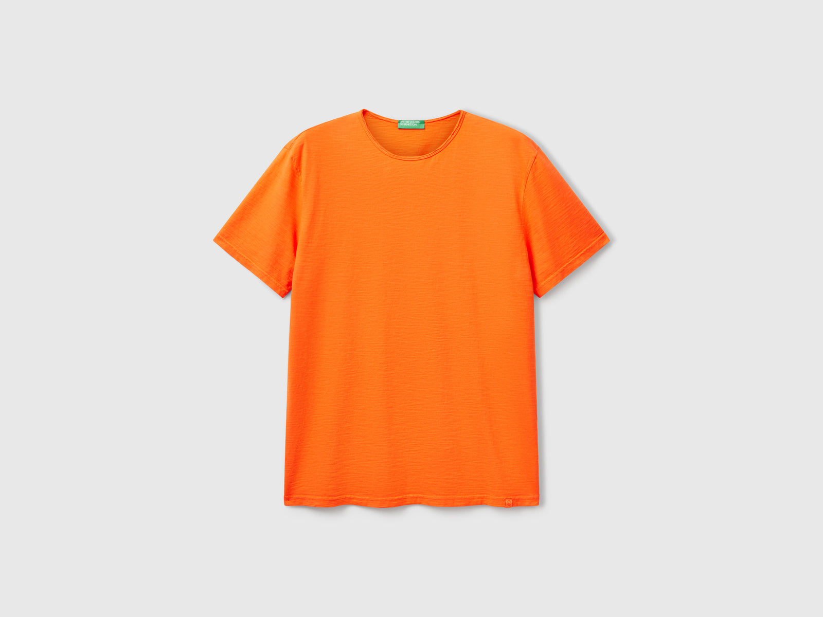 T-shirt ambra in cotone fiammato da uomo arancione | Benetton Outlet