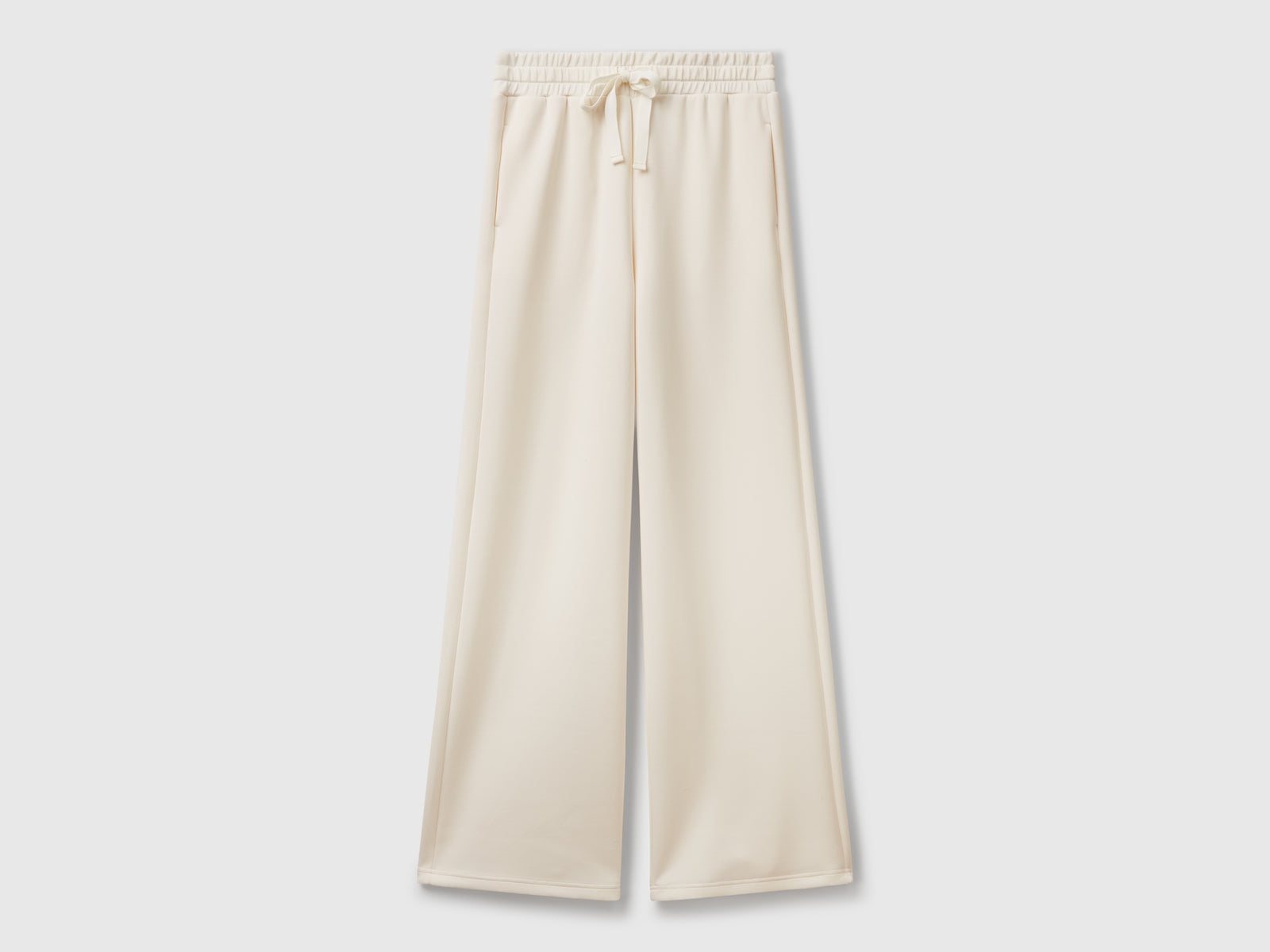 Pantaloni ampi in felpa da donna bianco panna | Benetton Outlet