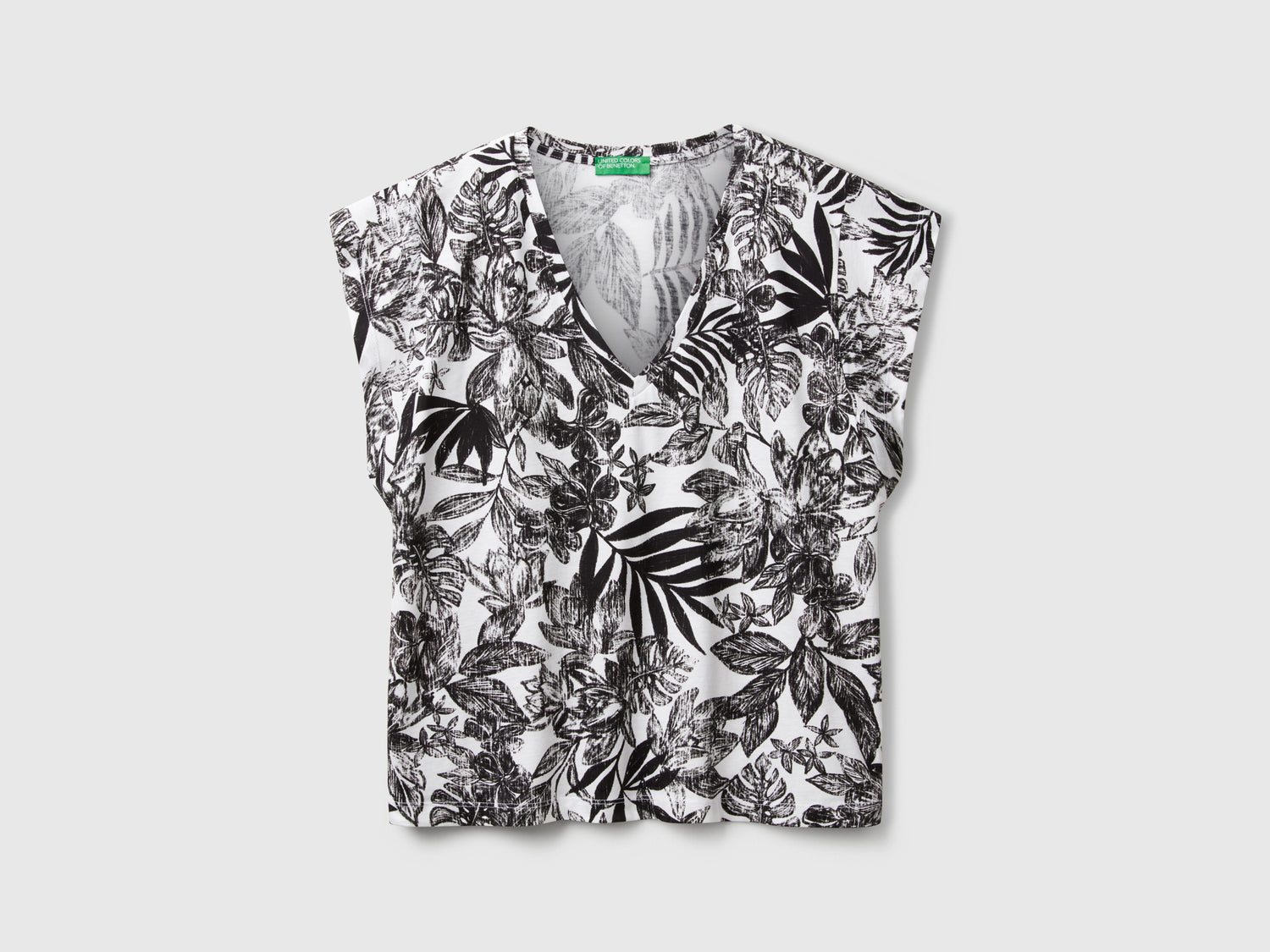 Maglietta con stampa fiori da donna nero | Benetton Outlet