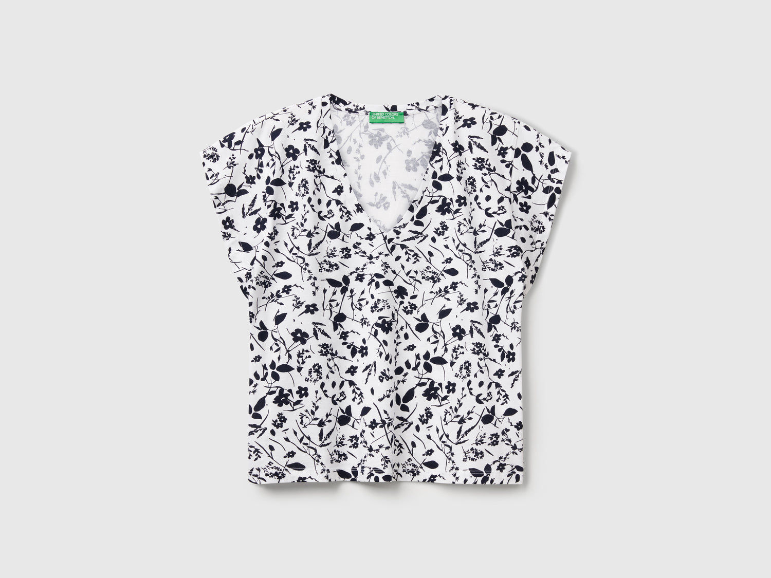 Maglietta con stampa fiori da donna bianco | Benetton Outlet