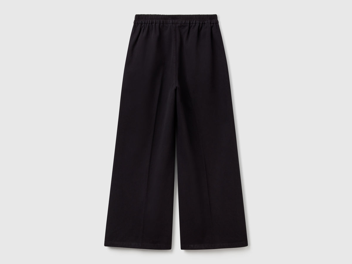 Pantaloni palazzo a vita alta