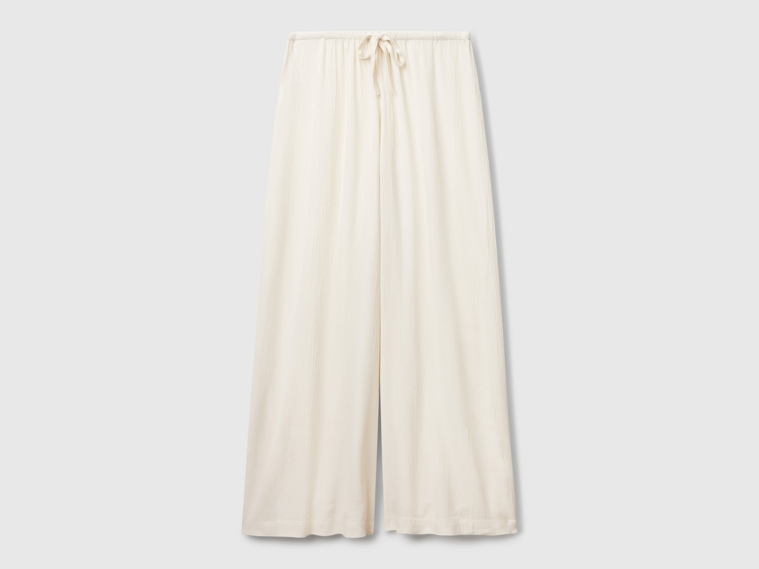 Wide flowing trousers da donna bianco panna | Benetton Outlet