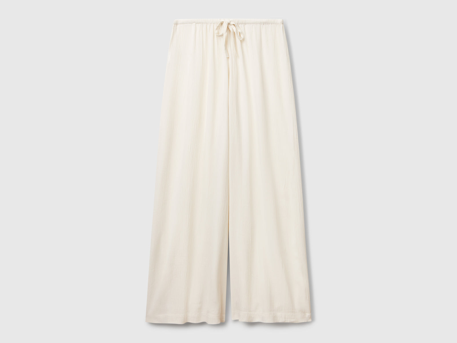 Wide flowing trousers da donna bianco panna | Benetton Outlet