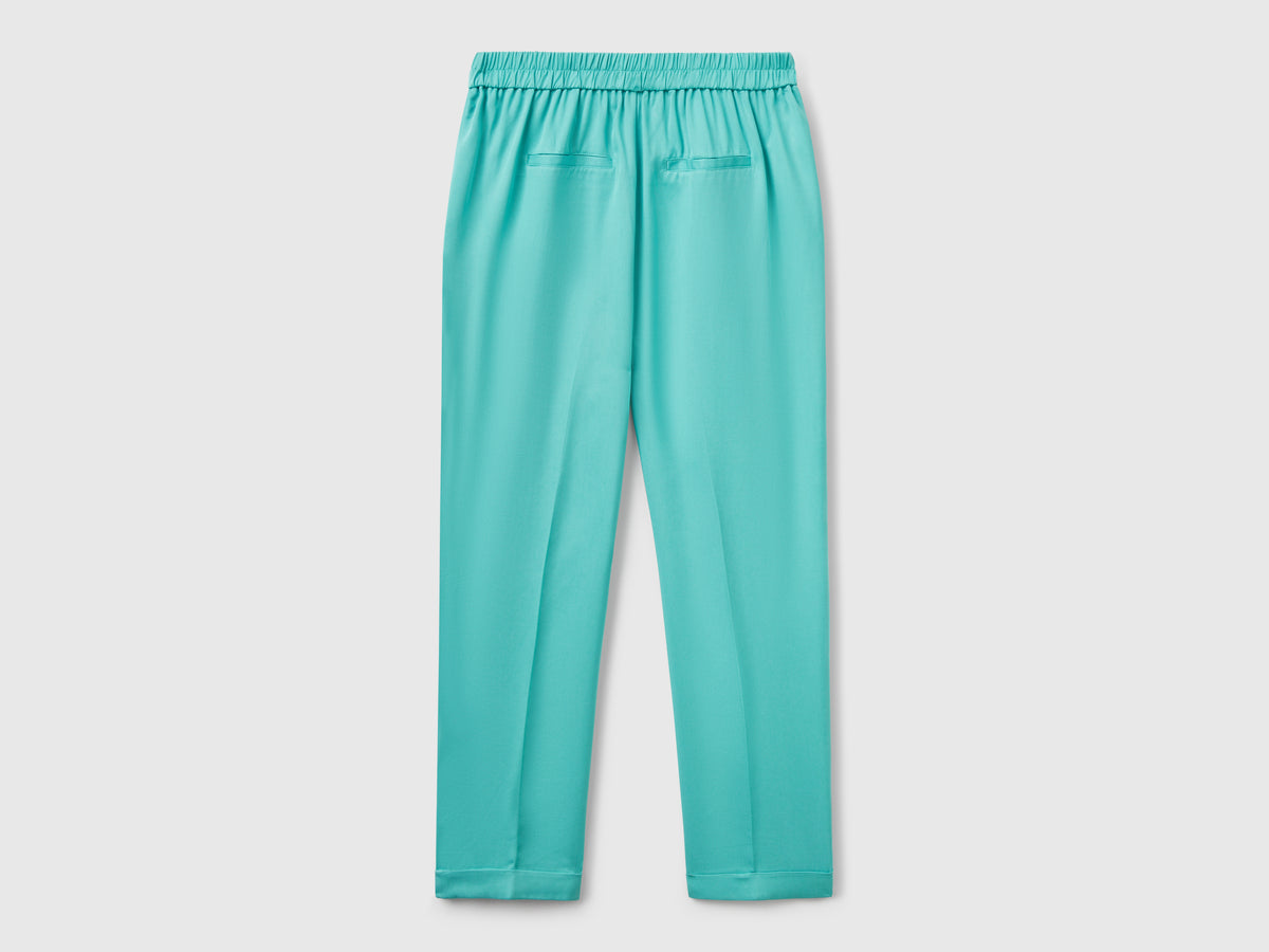 Pantaloni fluidi con risvolto