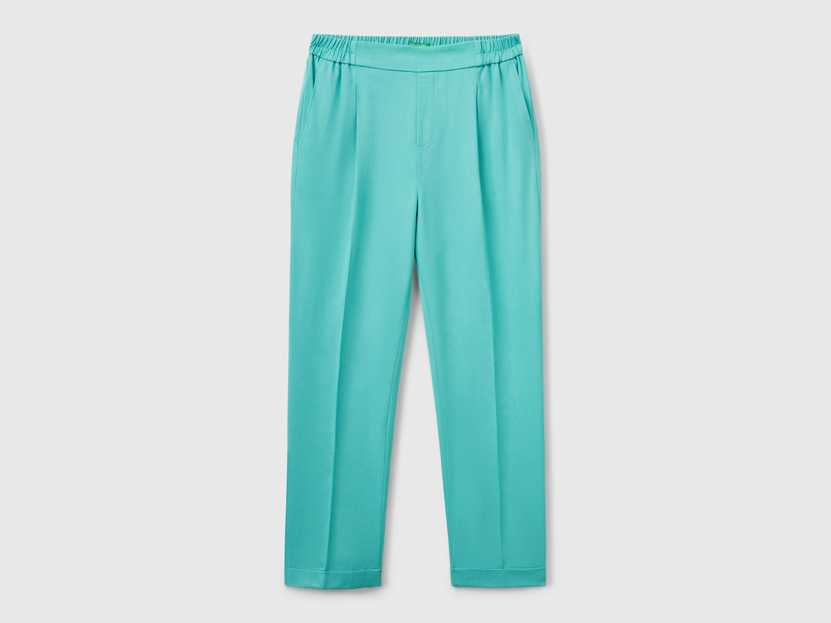 Pantaloni fluidi con risvolto