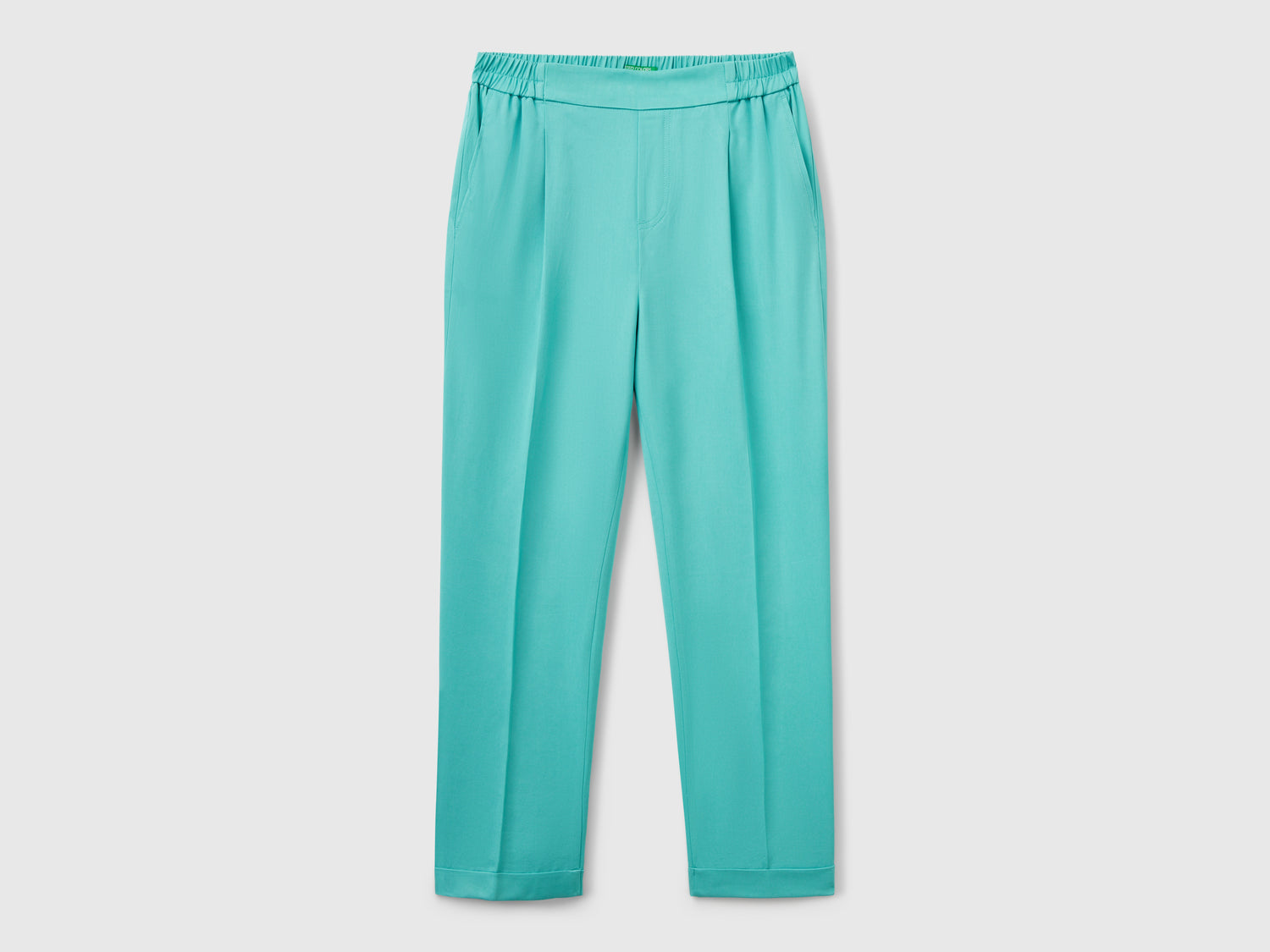 Pantaloni fluidi con risvolto da donna verde acqua | Benetton Outlet