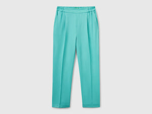 Pantaloni fluidi con risvolto