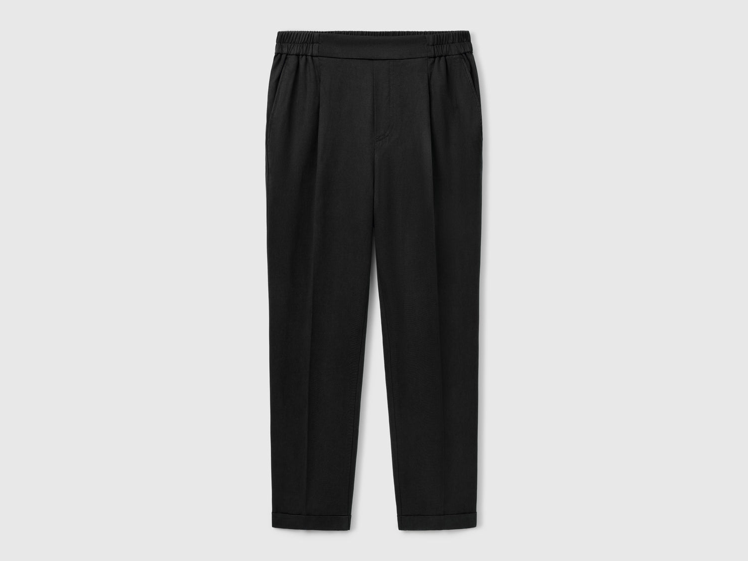 Pantaloni fluidi con risvolto da donna nero | Benetton Outlet