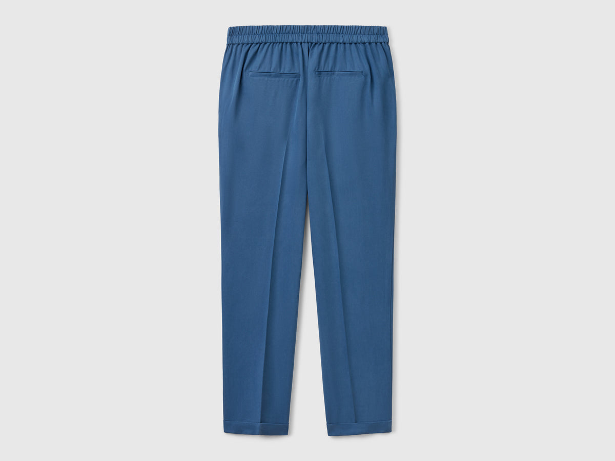 Pantaloni fluidi con risvolto