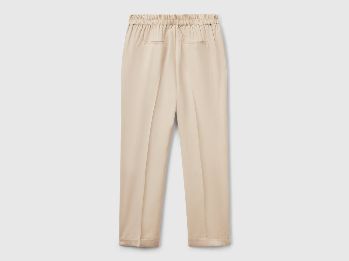 Pantaloni fluidi con risvolto