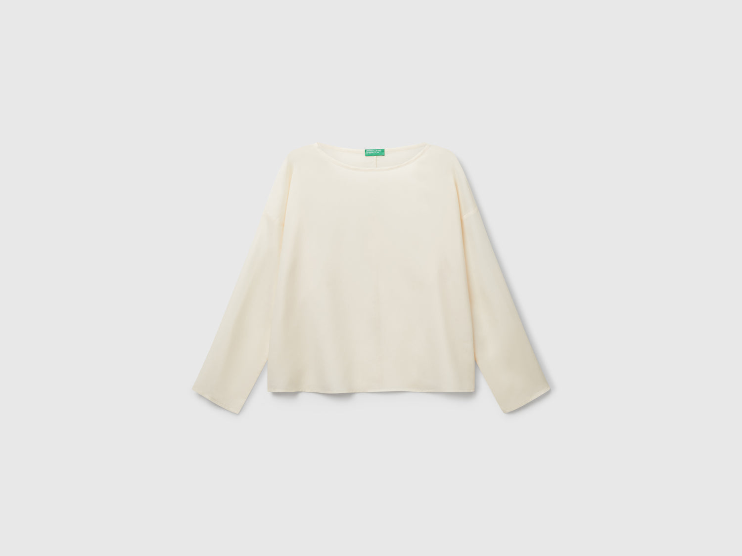 Blusa fluida da donna bianco panna | Benetton Outlet