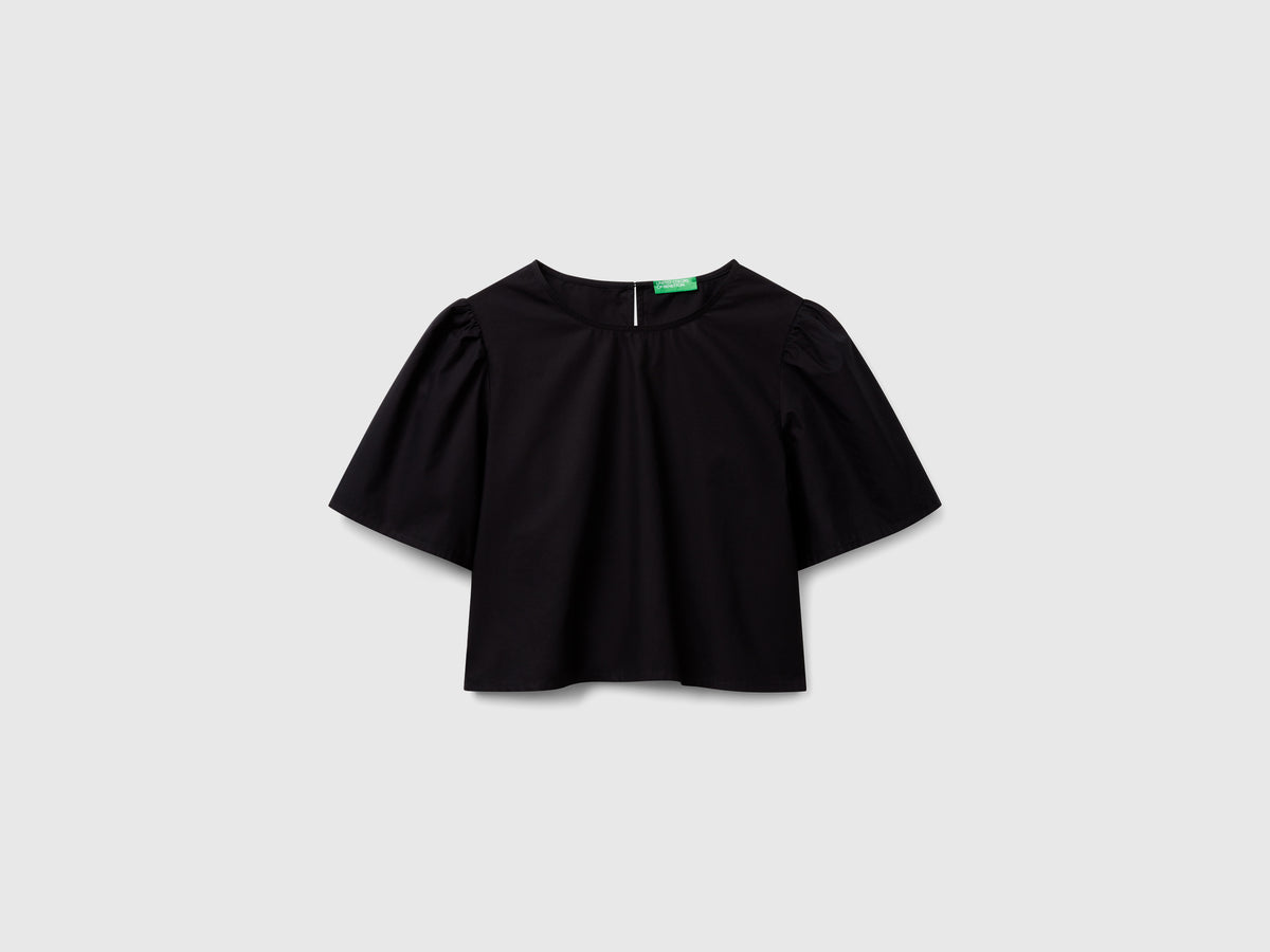 Blusa svasata con manica volant