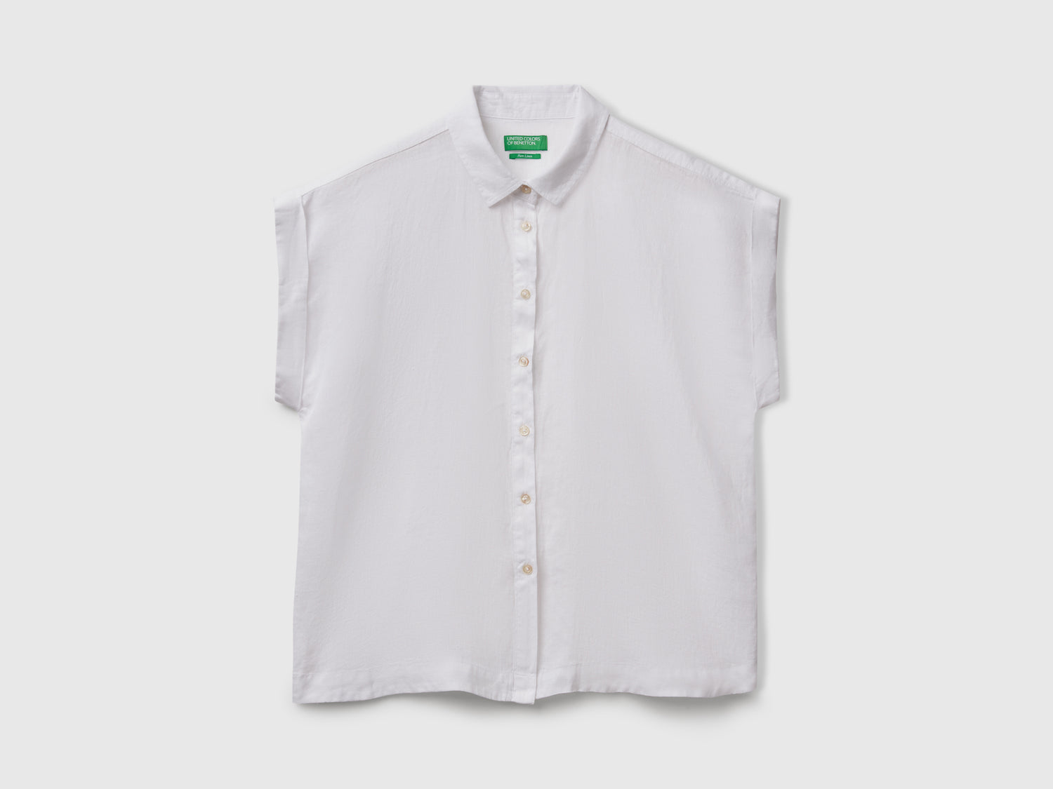 Camicia regular fit in puro lino da donna bianco | Benetton Outlet