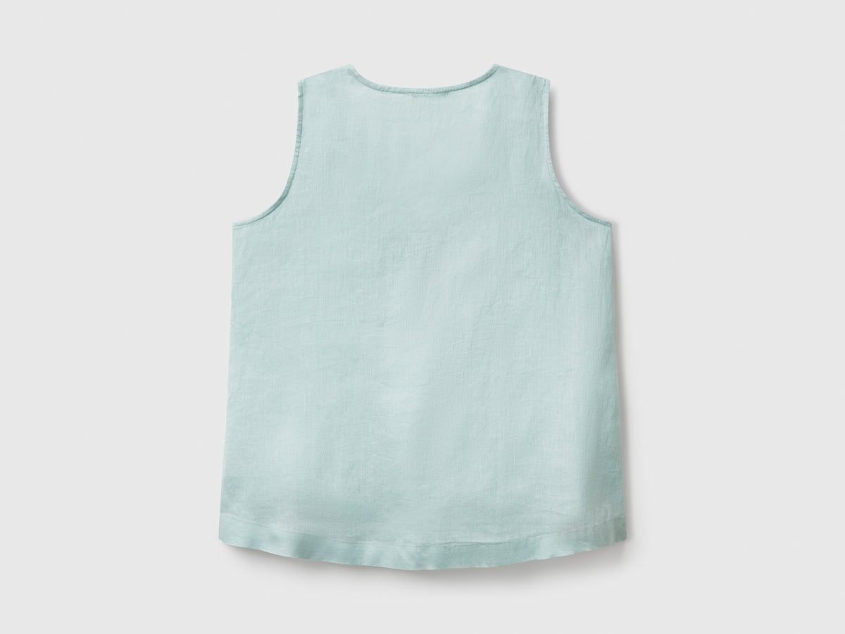Blusa smanicata in puro lino