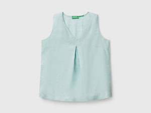 Blusa smanicata in puro lino