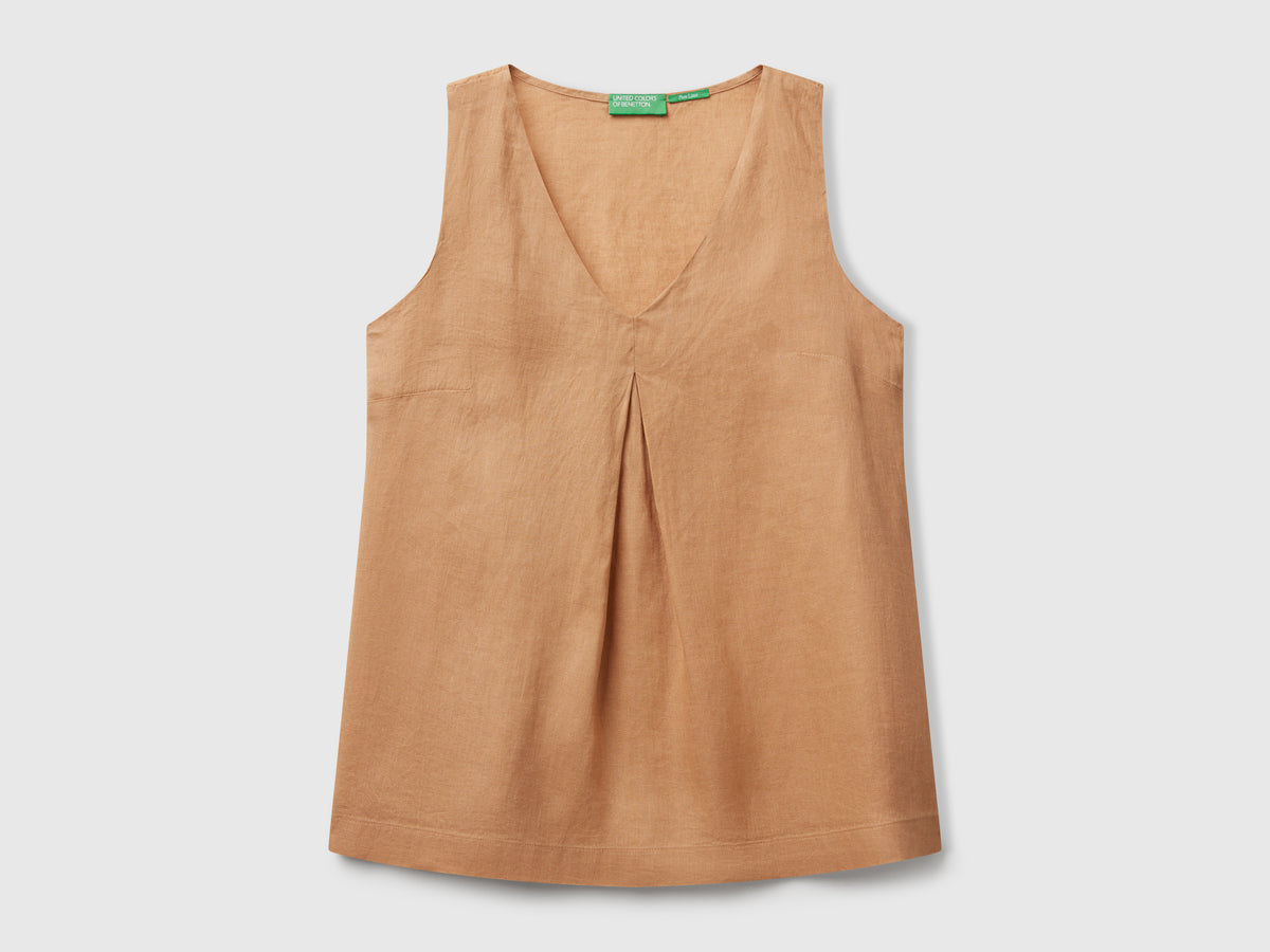 Blusa smanicata in puro lino