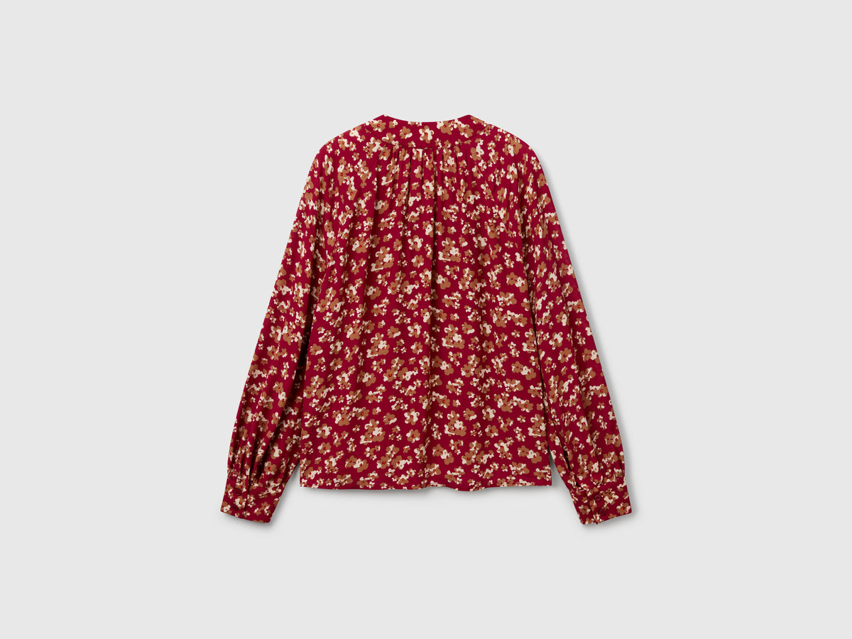 Blusa fluida a fiori
