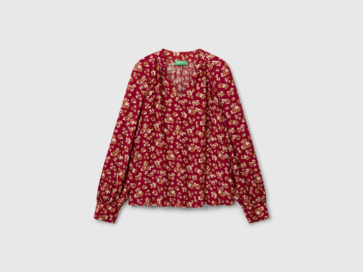 Blusa fluida a fiori