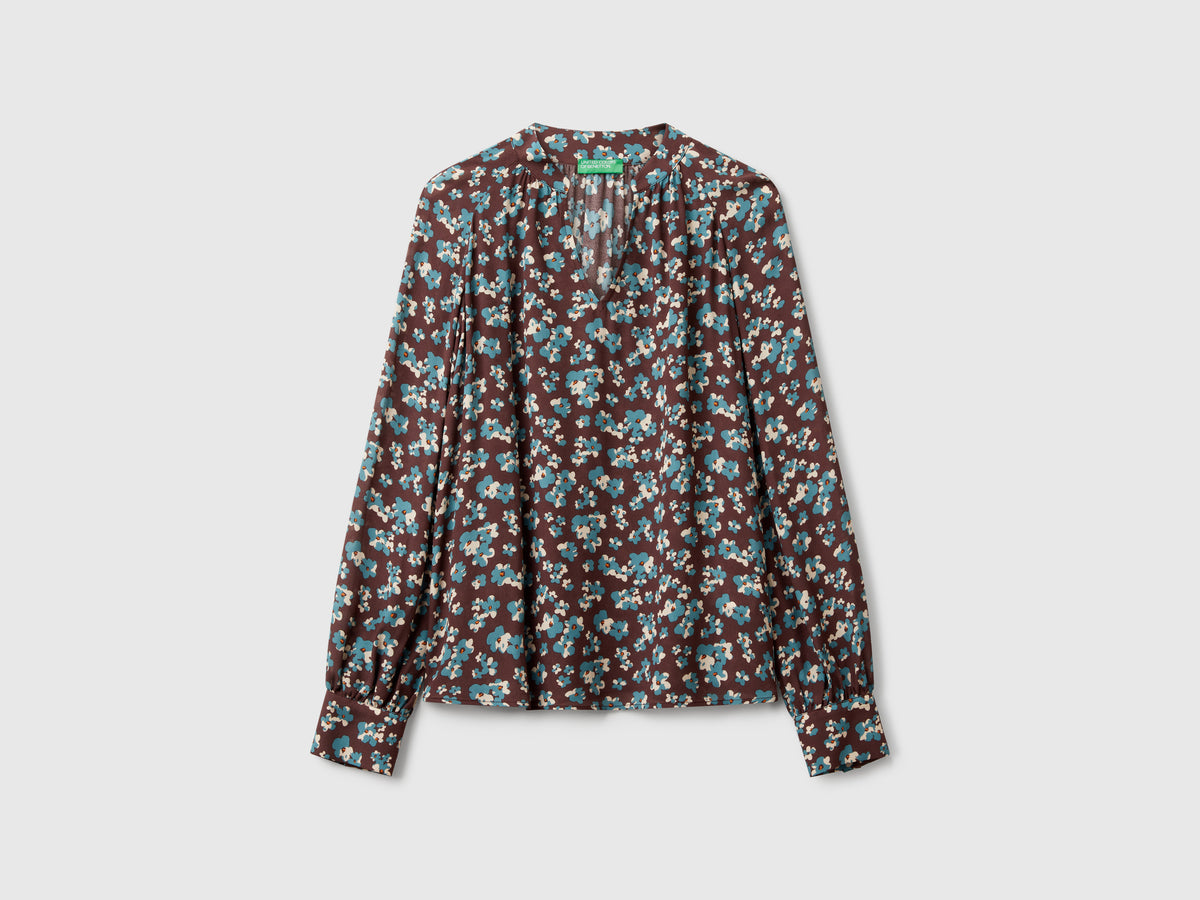 Blusa fluida a fiori