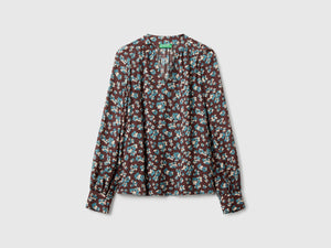Blusa fluida a fiori
