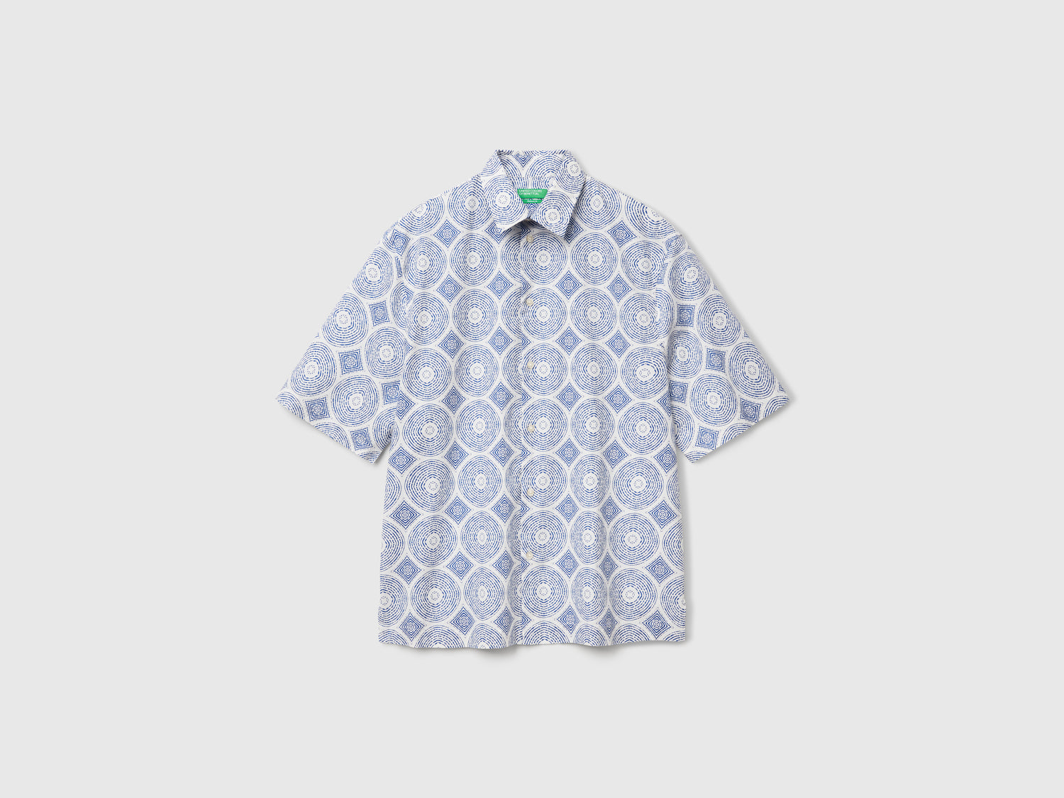 Camicia fantasia a manica corta da uomo blu | Benetton Outlet