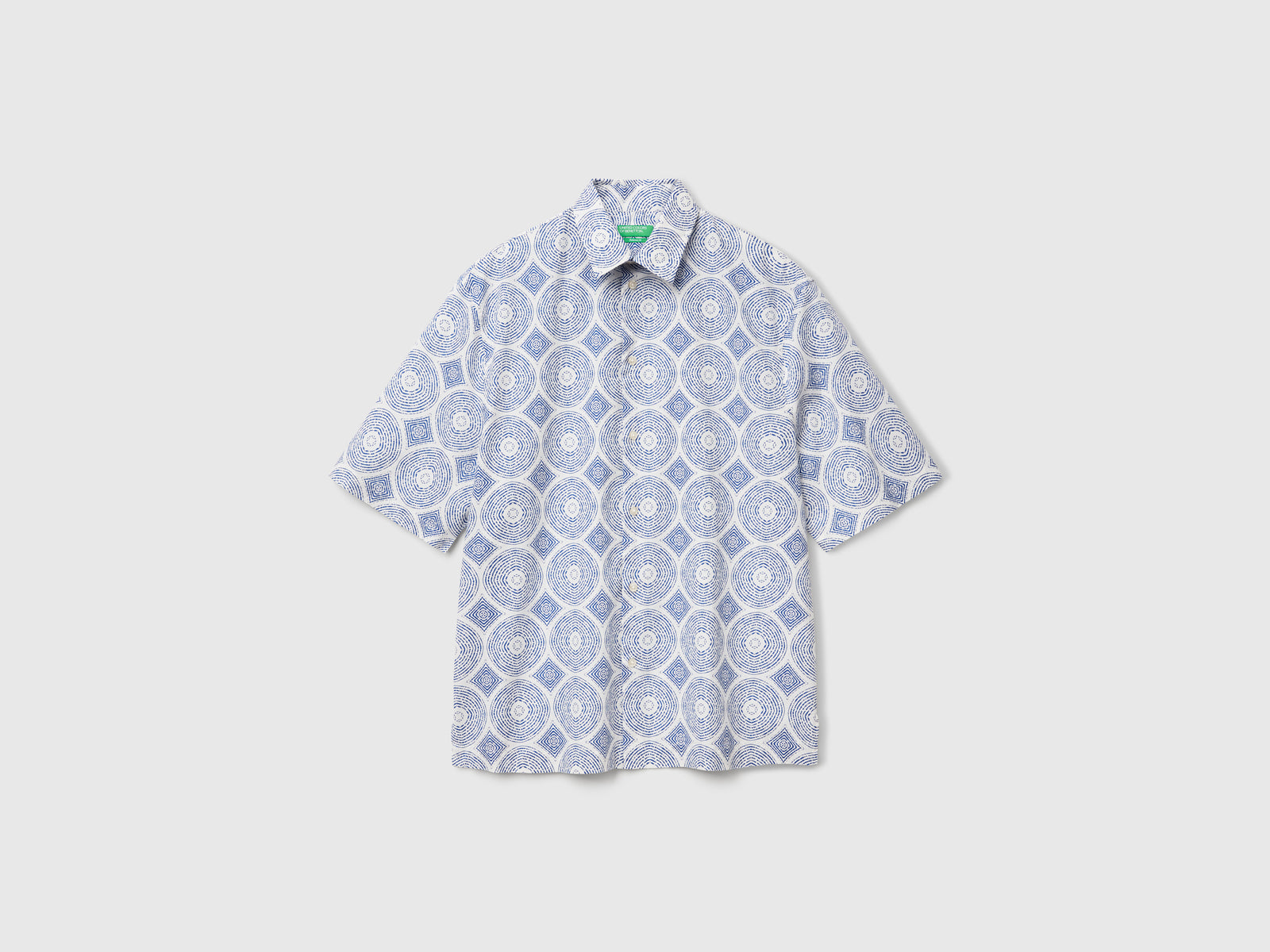 Camicia fantasia a manica corta da uomo blu | Benetton Outlet