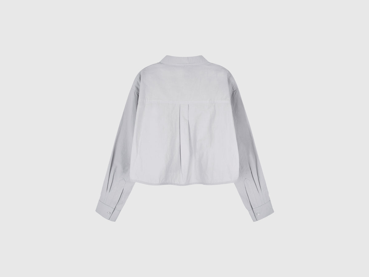 Camicia cropped a righe