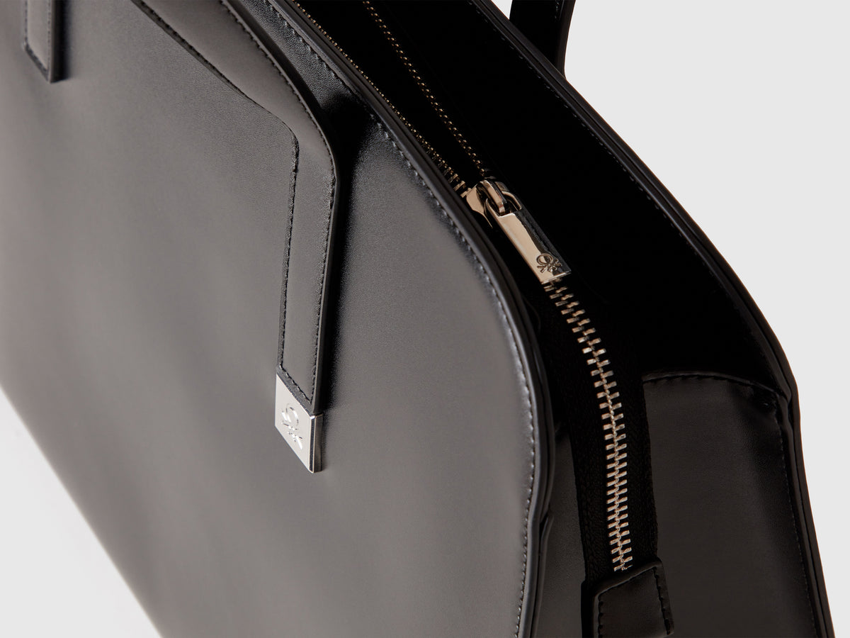 Shoulder bag with double handle