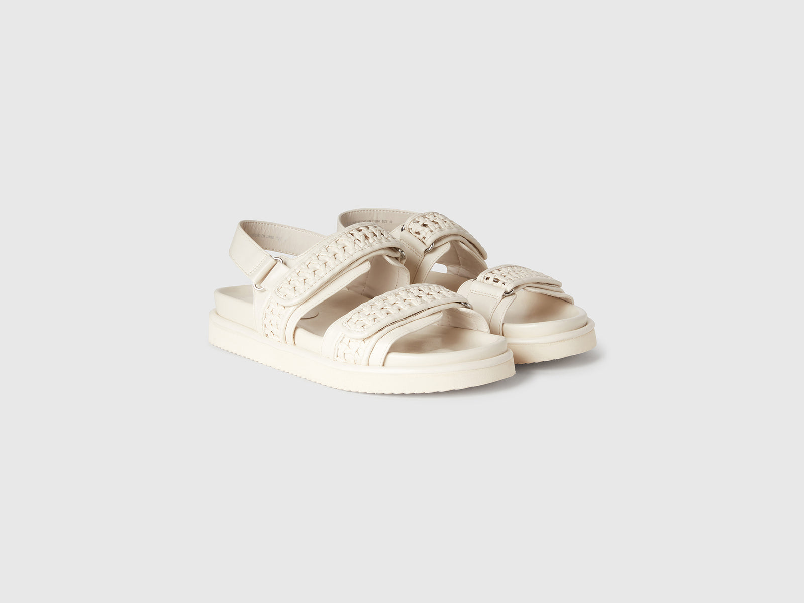 Open sandals in coated fabric da donna bianco panna 3 | Benetton Outlet