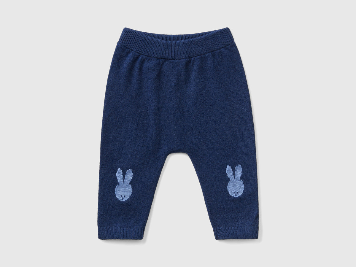 Knitted trousers with inlay